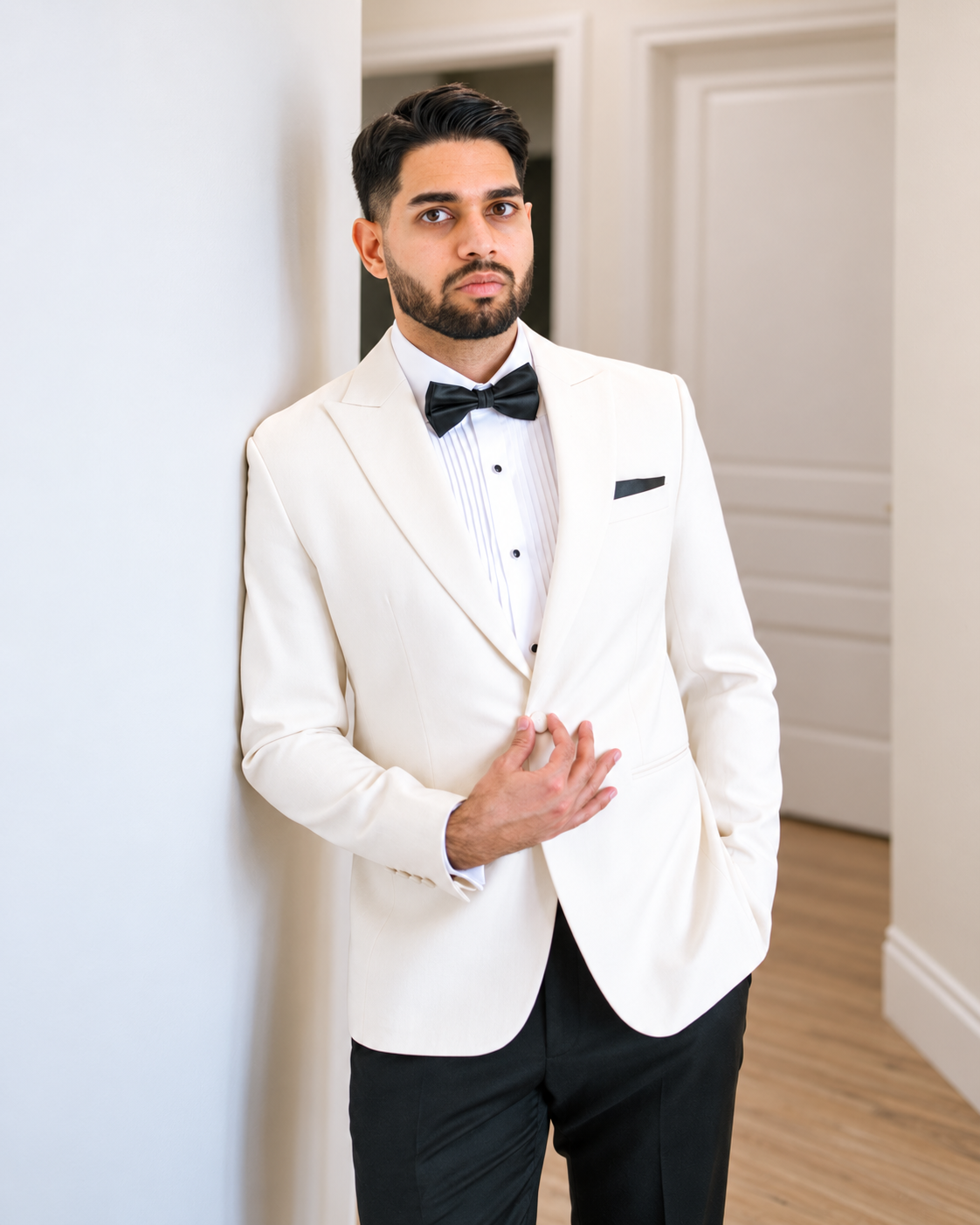 Mohit Parmar in a white jacket, cropped from his original portrait